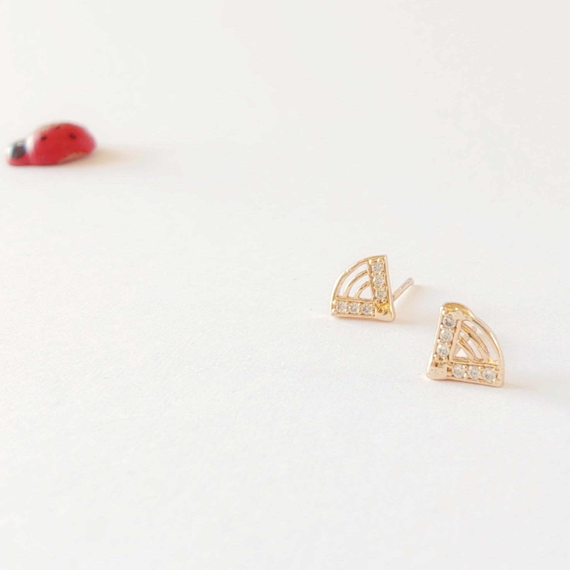 v shaped rose gold earrings with cubic zirconia